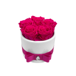 5 bright pink roses in white vase