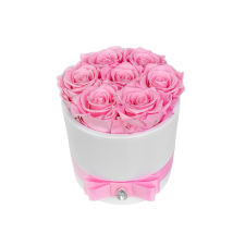 7 light pink roses in ceramic vase