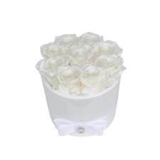 9 white roses in caremic vase